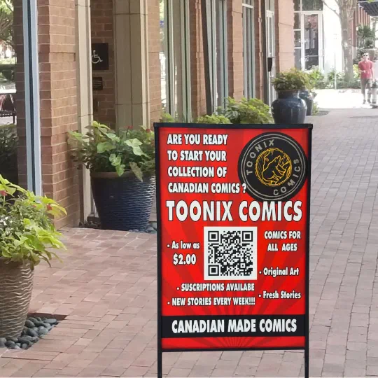 A printed A-frame sidewalk sign for Toonix Comics standing outside a shopfront